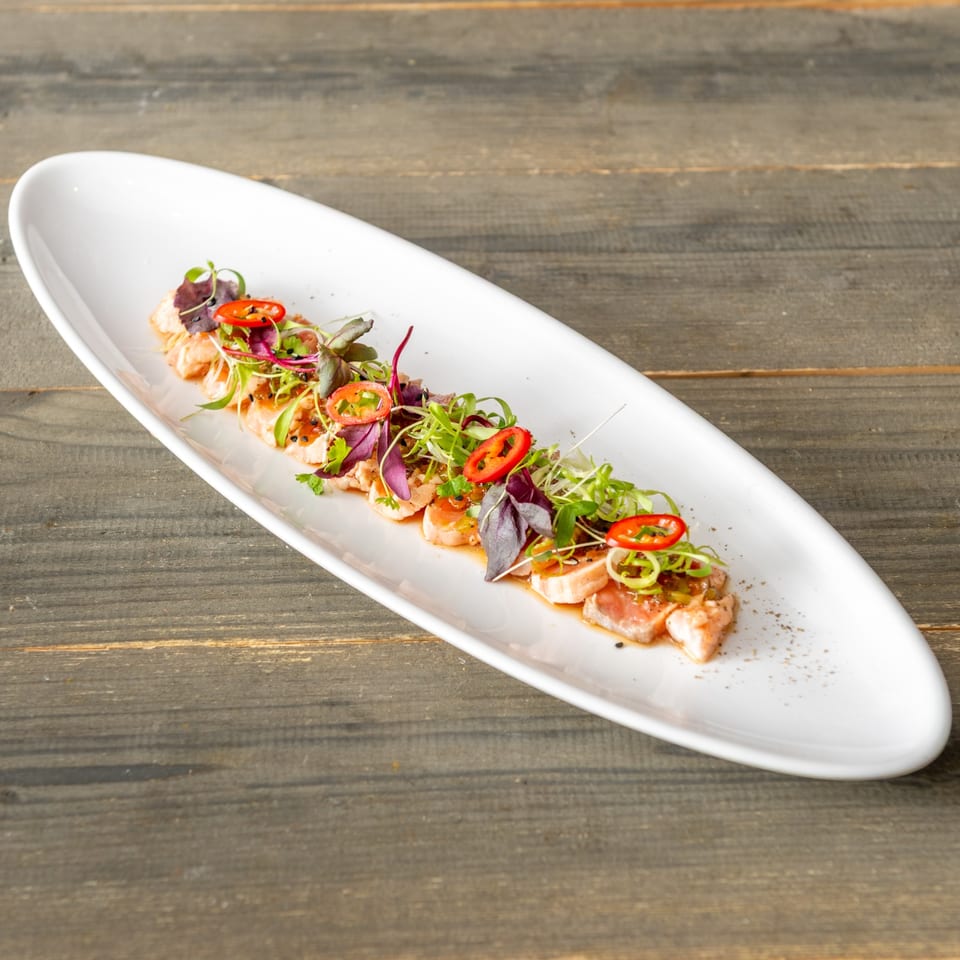 Yellowtail sashimi with microgreens