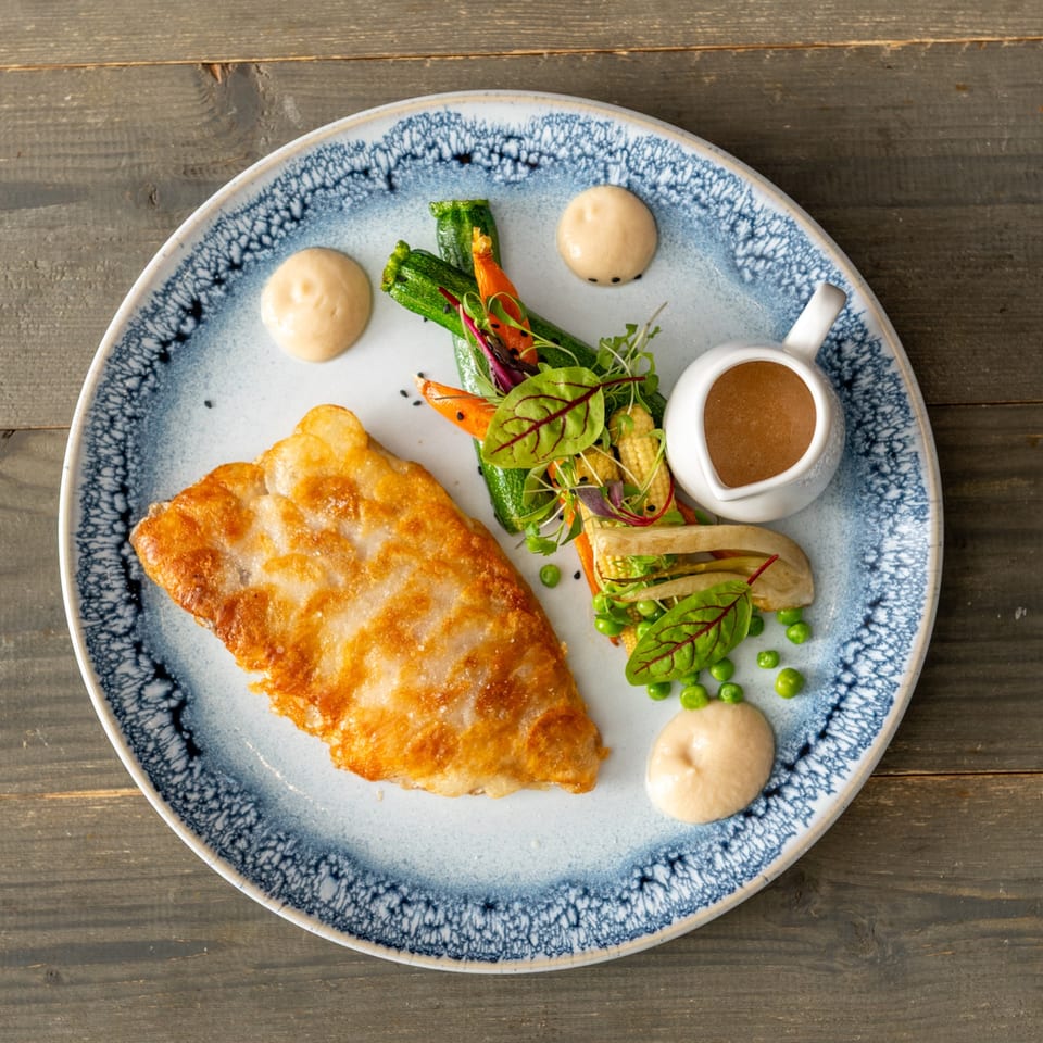 Golden fish fillet with mixed vegetables
