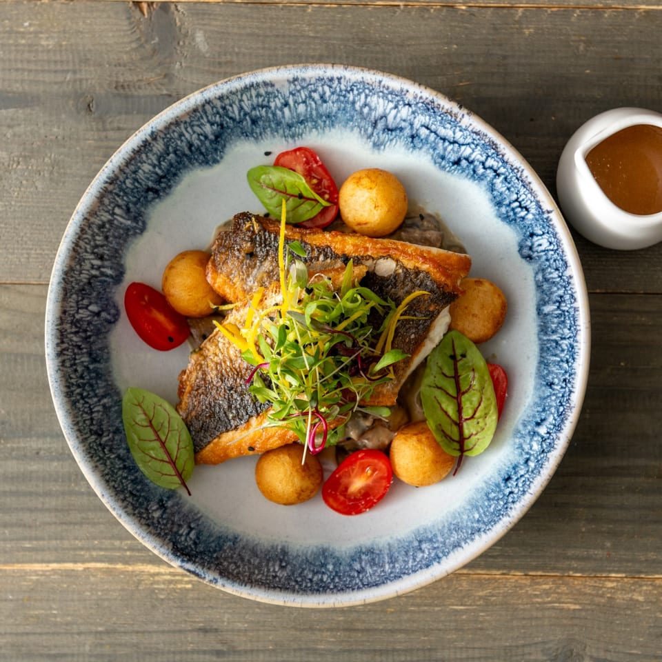 Seared fish with golden potatoes
