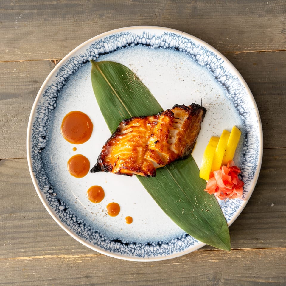Miso-glazed fish on a leaf