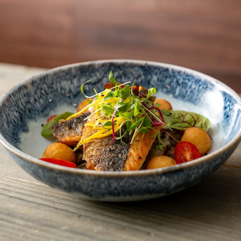 Branzino with creamy mushrooms